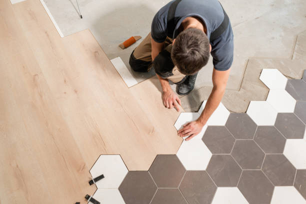 The combination of wood panels of laminate and ceramic tiles in the form of honeycomb. Kitchen renovation.